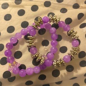 Hand made purple brackets with butterfly’s and flowers